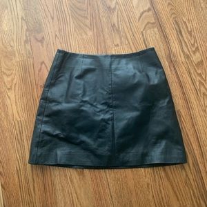 Black faux leather mini skirt